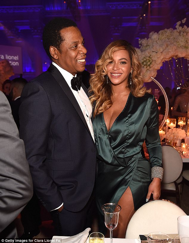 Jay-Z-busty-Beyonce-make-rare-public