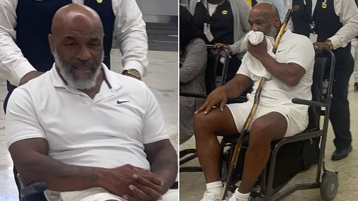 Mike Tyson is pictured in a wheelchair at Miami Airport, raising new fears for his health